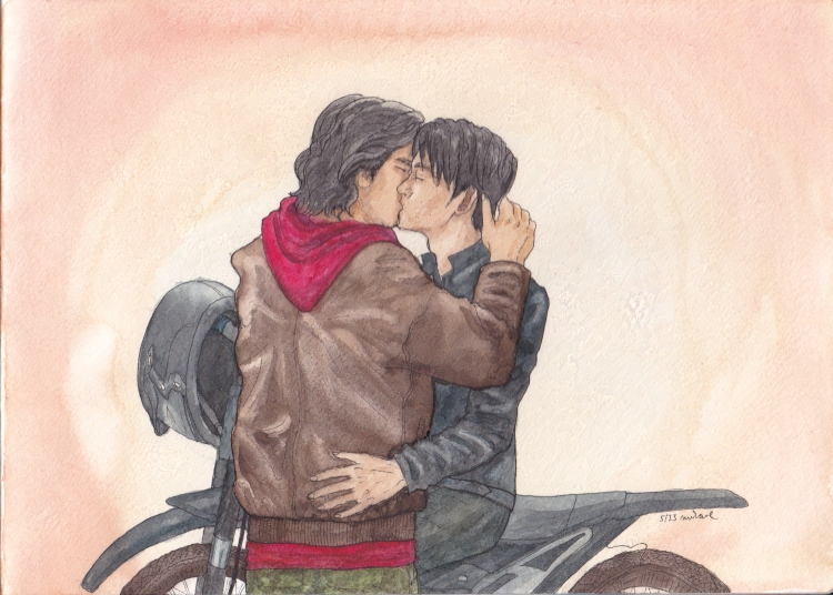 a man on a motorcycle being kissed